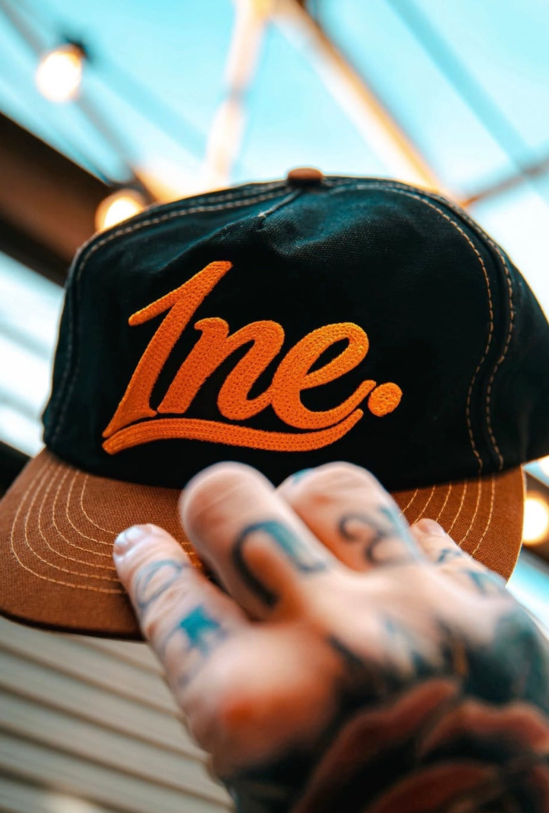 House of 1NE Hats