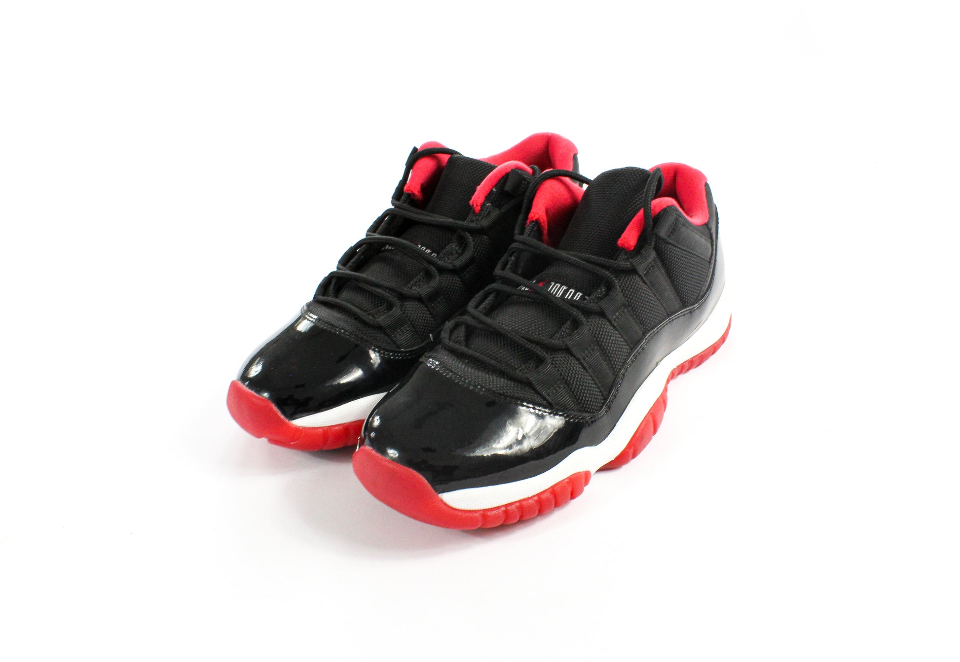 Jordan 11 Retro Low 'Bred' (GS) - 1NE.derby